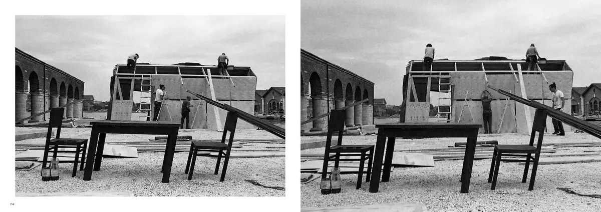 The timber frame with a table and two chairs in front of it, on both pages, a moment apart