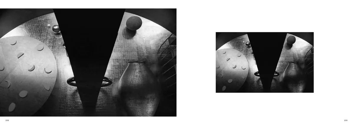 A disc set with stones, split by a black triangle, across the left page, and the same view small on the right