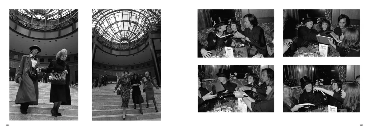 Two photographs on a staircase under a glass dome, facing four of a dinner