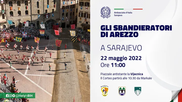 Flag throwers in a medieval square beside GLI SBANDIERATORI DI AREZZO A SARAJEVO, 22 May 2022